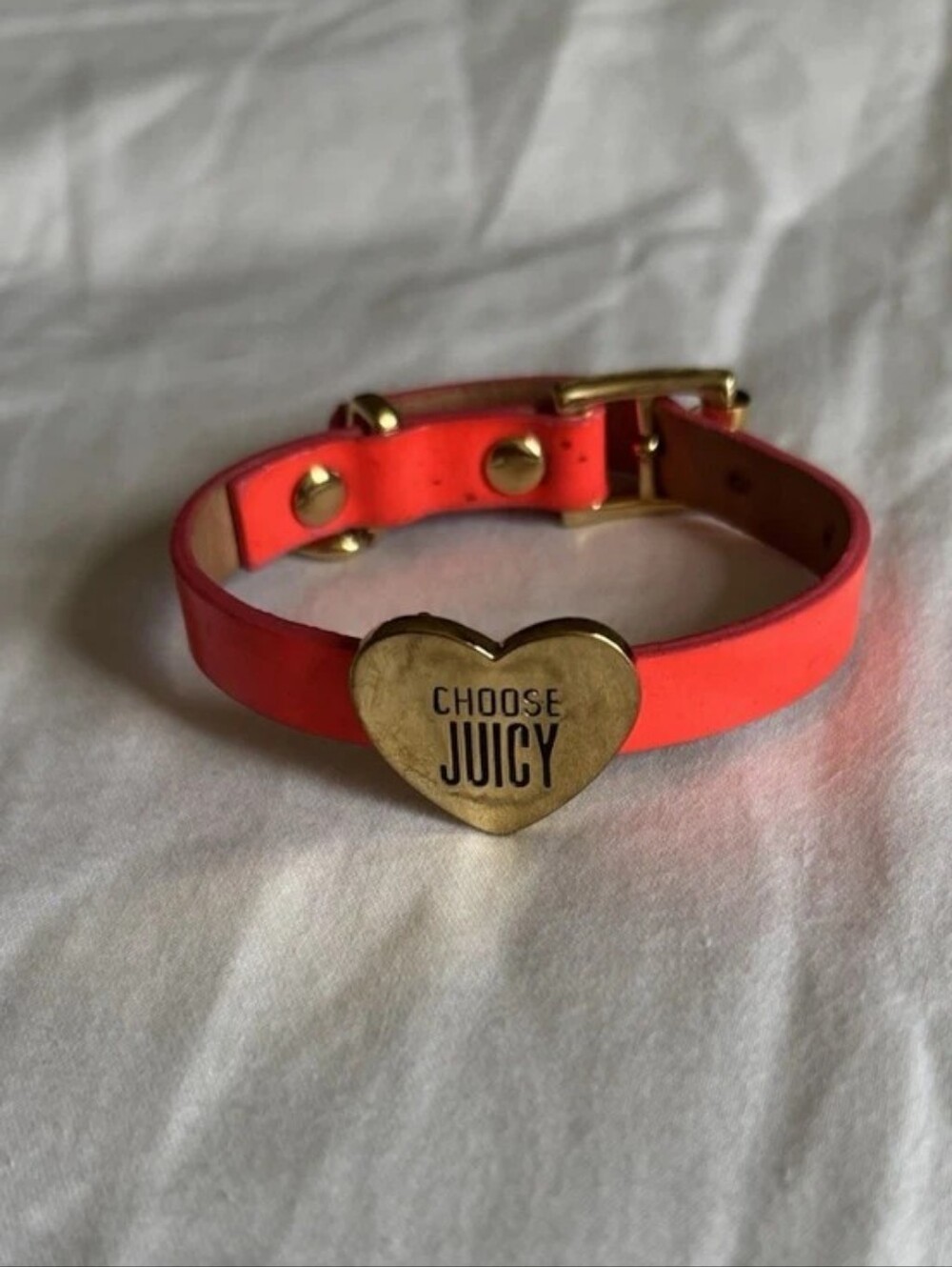 NWT Juicy Couture "Choose Juicy" heart leather bracelet in Vibrant Orange